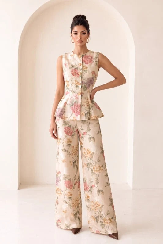 Conjunto floral con top peplum y pantalón amplio