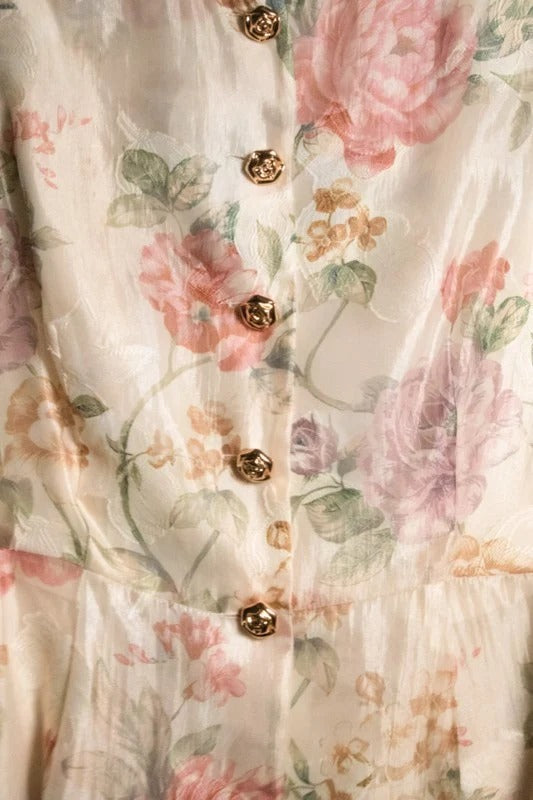 Conjunto floral con top peplum y pantalón amplio