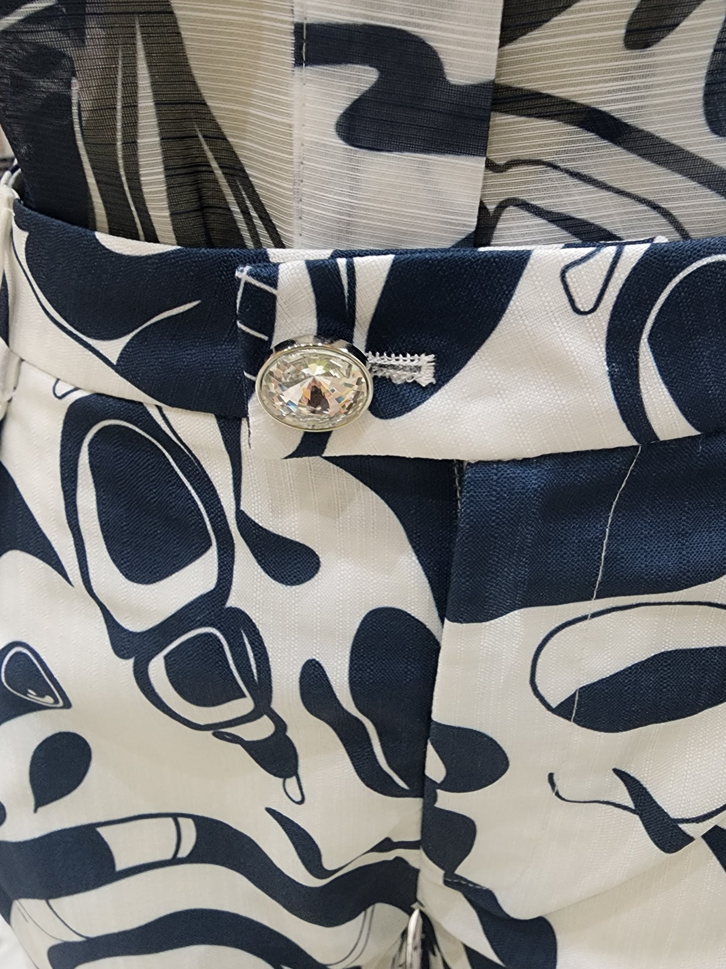 Pantalon y blusa navy con piedras en el botón